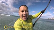 sup-surfing-in-waikiki-with-the-menehune-hat-clip-menehune-mount