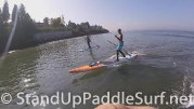 sup-surfing-freighter-waves-in-seattle