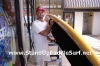 Attaching Handles on Stand Up Paddle Board at Wet Feet Hawaii