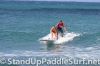 zane-and-shelby-schwietzer-tandem-sup-surfing-05