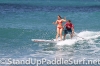 zane-and-shelby-schwietzer-tandem-sup-surfing-08