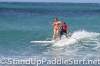 zane-and-shelby-schwietzer-tandem-sup-surfing-09