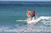 zane-and-shelby-schwietzer-tandem-sup-surfing-10