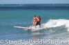 zane-and-shelby-schwietzer-tandem-sup-surfing-16