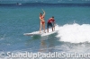 zane-and-shelby-schwietzer-tandem-sup-surfing-19