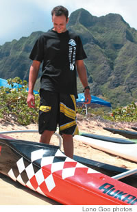 Luke Evslin with canoes he built