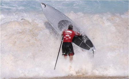 Garrett McNamara on the shorebreak