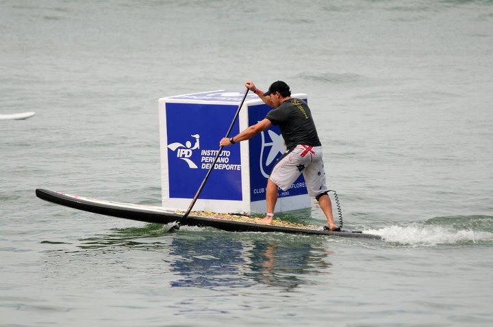 Travis Grant rounds a buoy during the ISA SUP Technical Race Finals on Friday.